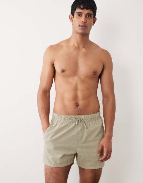 ASOS DESIGN short length seersucker swim shorts in sage green - view 1