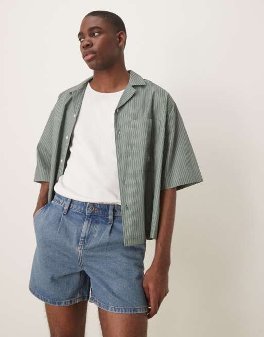 ASOS DESIGN short length slim denim shorts with pleats in mid wash blue