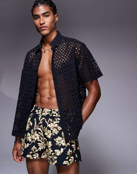 ASOS DESIGN short length swim shorts in black floral print - view 1