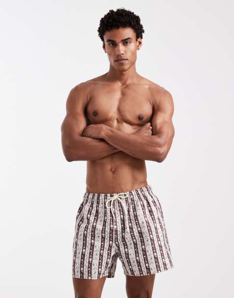 ASOS DESIGN short length swim shorts with floral stripes in brown - view 1