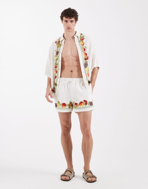 ASOS DESIGN short length swim shorts with fruit border print in off white - part of a set - view 1