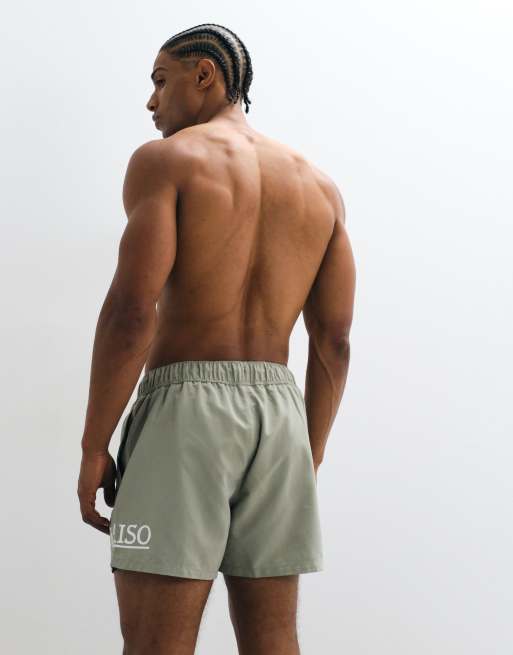 ASOS DESIGN short length swim shorts with placement print in sage green, 3 of 5