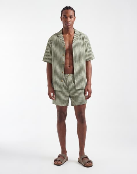 ASOS DESIGN short length wide fit shorts in green stripe - view 1