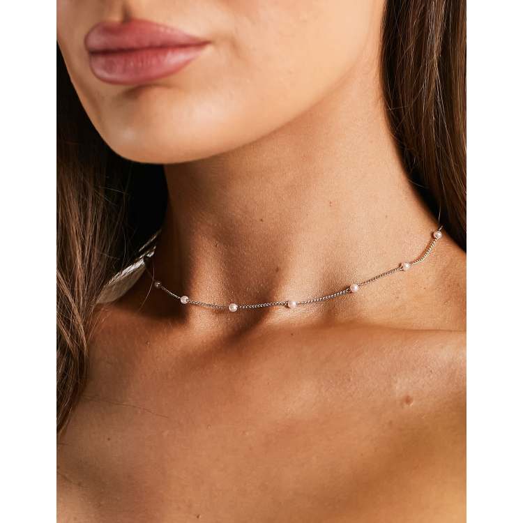 ASOS DESIGN short necklace/choker with faux pearl design in gold tone