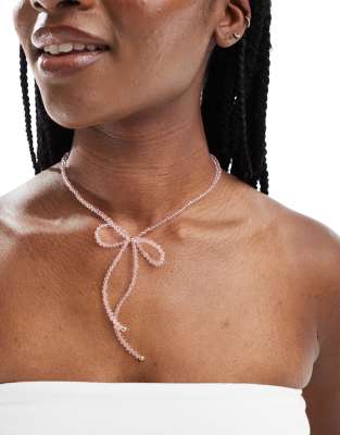 ASOS DESIGN short necklace with faceted bead bow in pink design