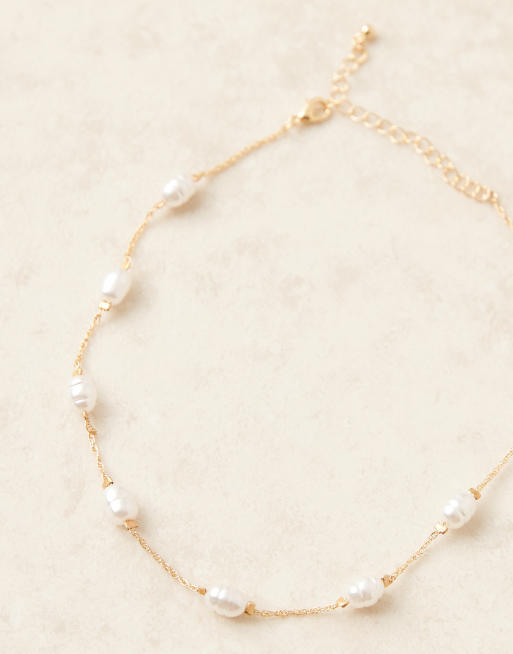 ASOS DESIGN short necklace with mixed sized faux pearl in gold tone