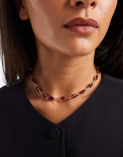 ASOS DESIGN short necklace with red faux crystal stone settings in gold tone