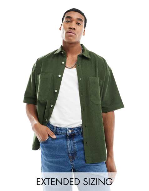 ASOS DESIGN short sleeve 90s oversized cord shirt in dark green - view 1