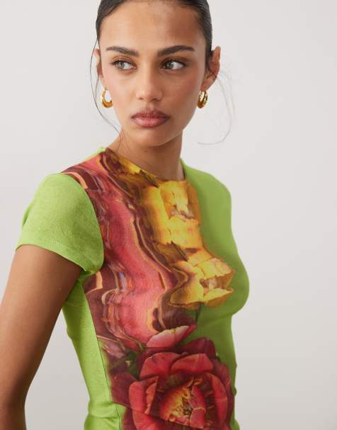 ASOS DESIGN short sleeve baby top in green with floral print - view 1