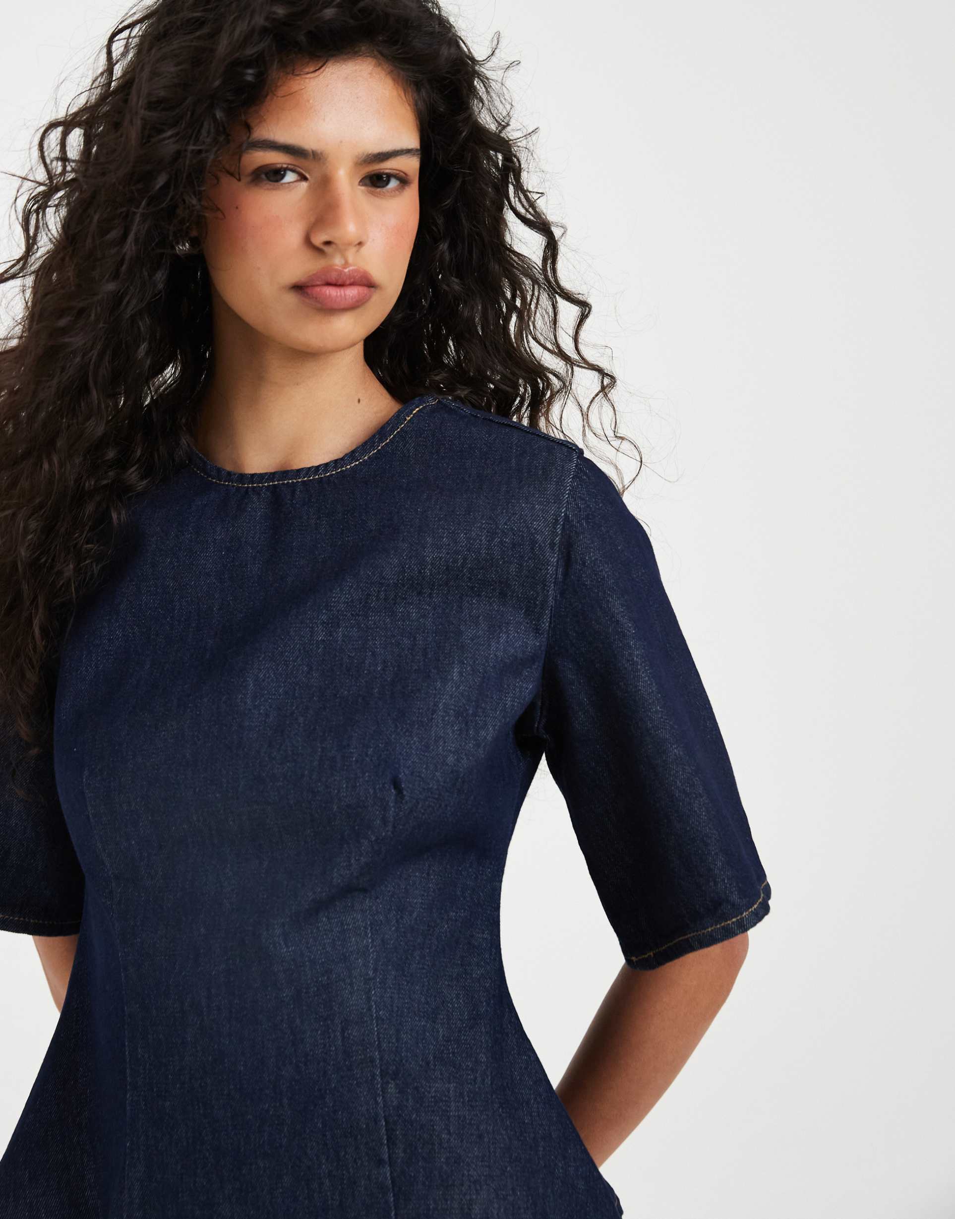 asos design short sleeve denim peplum top in indigo