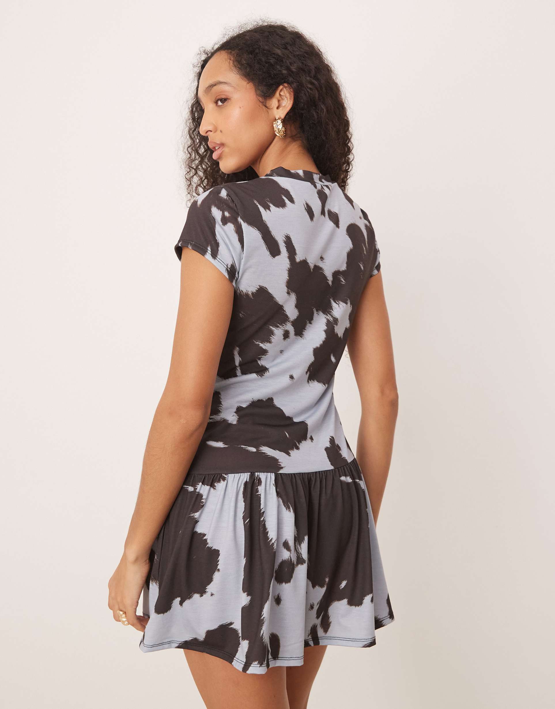 asos design short sleeve dropped waist mini dress in blue cow print