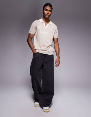 Asos Design Short Sleeve Knit Polo With Sports Graphic In Neutral