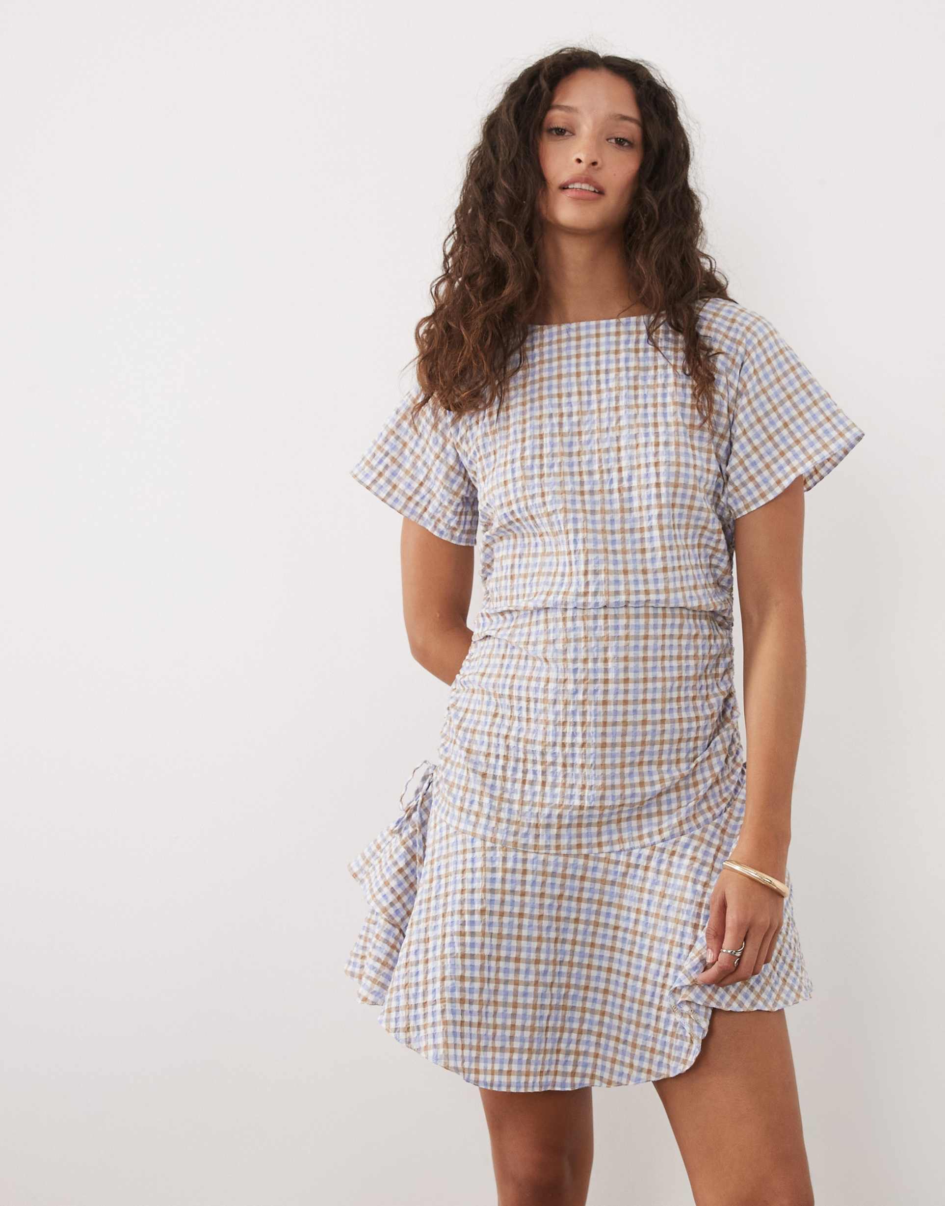 asos design short sleeve mini dress with ruching tie waist detail in blue and brown plaid