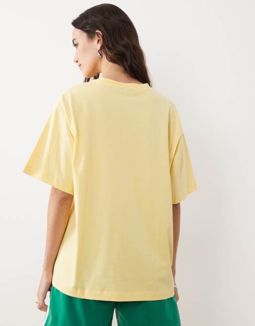 ASOS DESIGN short sleeve oversized t-shirt with running club graphic in buttermilk, 2 of 4