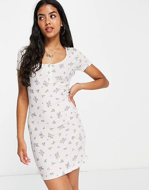 ASOS DESIGN short sleeve ribbed mini dress in white and blue ditsy floral