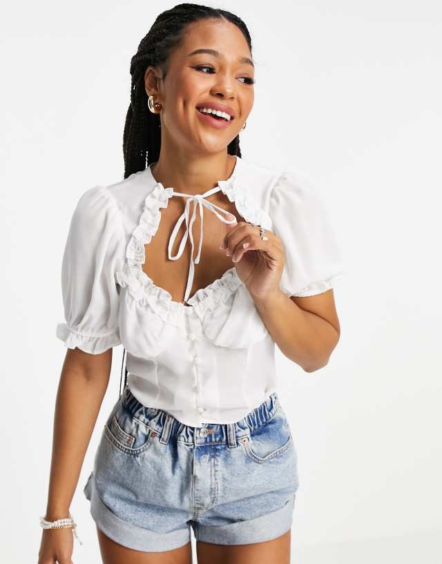 ASOS DESIGN short sleeved ruched front top with cut out neck in ivory