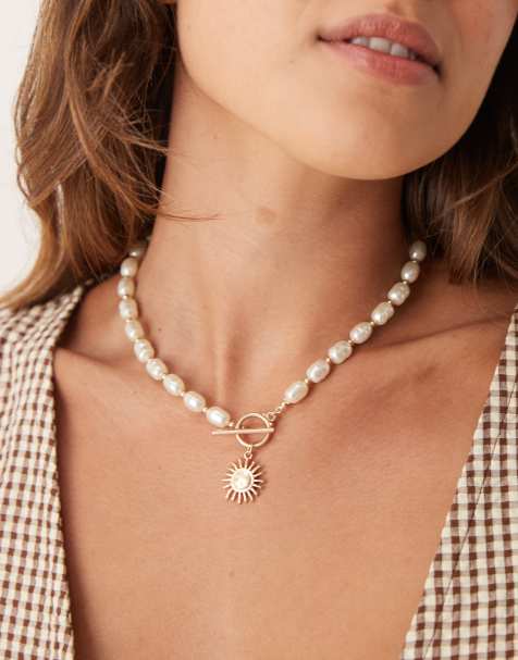 ASOS DESIGN short t-bar necklace in faux pearls with gold tone sun pendant - view 1