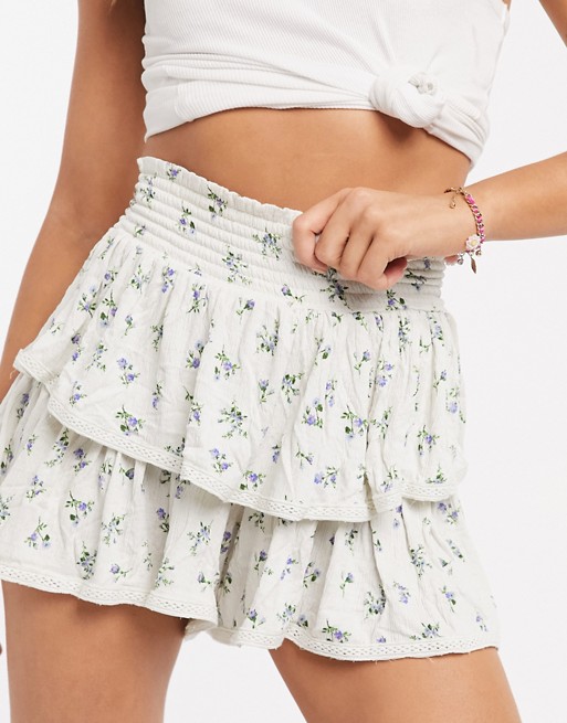 ASOS DESIGN short with shirring and ruffles in ditsy print