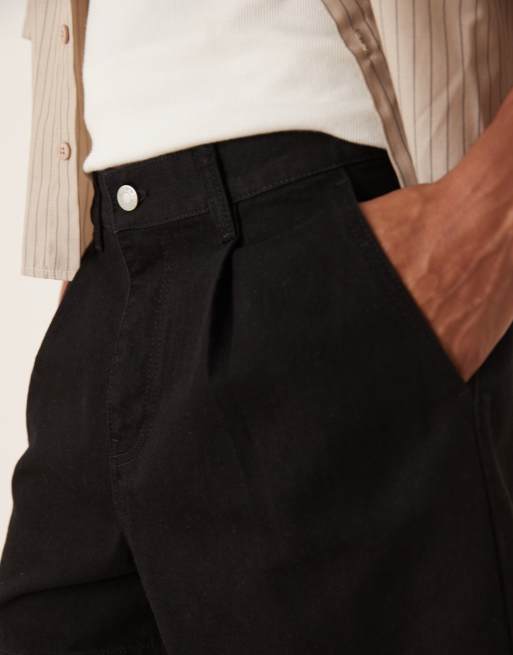 ASOS DESIGN shorter length denim short with pleats in black
