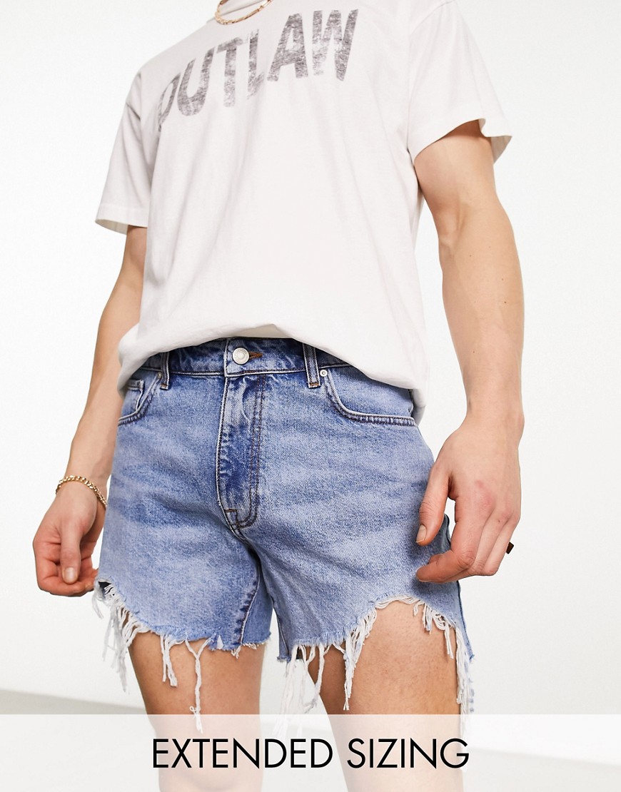 ASOS DESIGN shorter length denim shorts in light wash with rip detail and raw hem-Blue