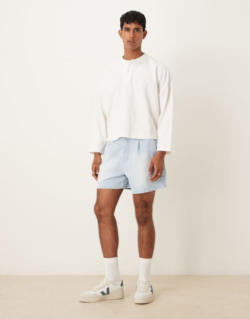 ASOS DESIGN shorter length denim shorts with pleats in bleach wash