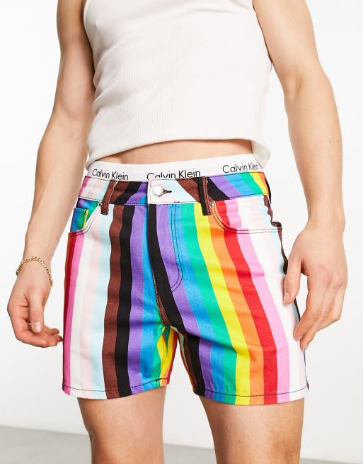 ASOS DESIGN shorter length denim shorts with rainbow print