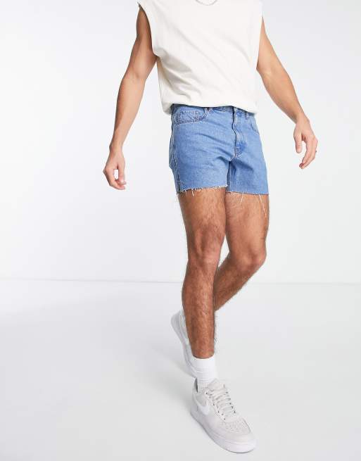 ASOS DESIGN shorter length denim shorts with rainbow print