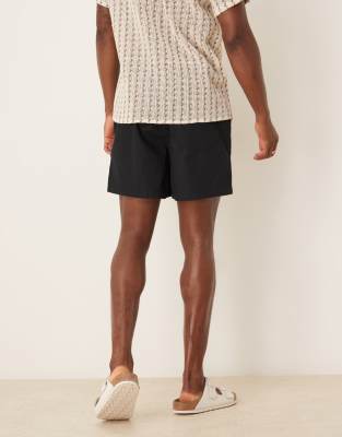 ASOS DESIGN shorter length linen blend shorts in black