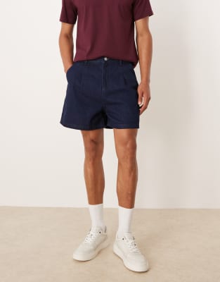 shorter length pleated denim shorts in raw wash-Blue