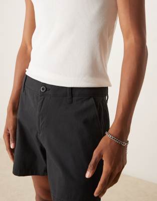 ASOS DESIGN shorter length pull on chino short in black