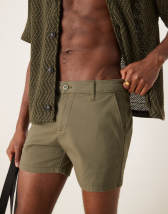 ASOS DESIGN shorter length skinny chino shorts in navy