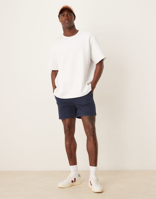 ASOS DESIGN shorter length skinny chino shorts in navy