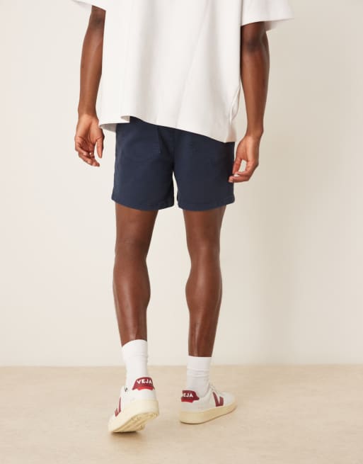 ASOS DESIGN shorter length skinny chino shorts in navy