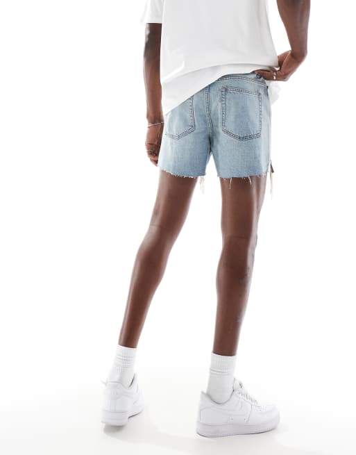 ASOS DESIGN shorter length slim denim shorts in light wash blue with rip detail, 3 of 5