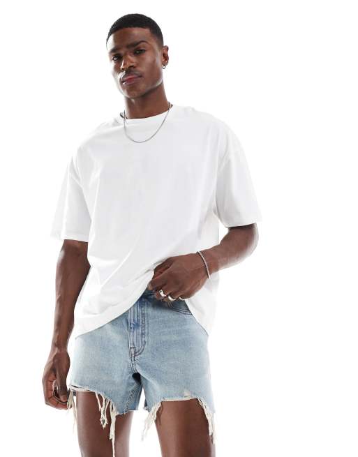 ASOS DESIGN shorter length slim denim shorts in light wash blue with rip detail, 4 of 5