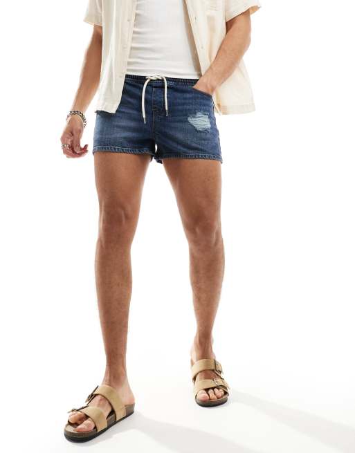 ASOS DESIGN shorter length slim denim shorts with distressing in dark wash blue, 3 of 5