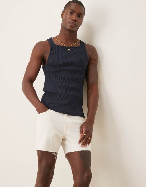 ASOS DESIGN shorter length slim denim shorts with rip detail in white