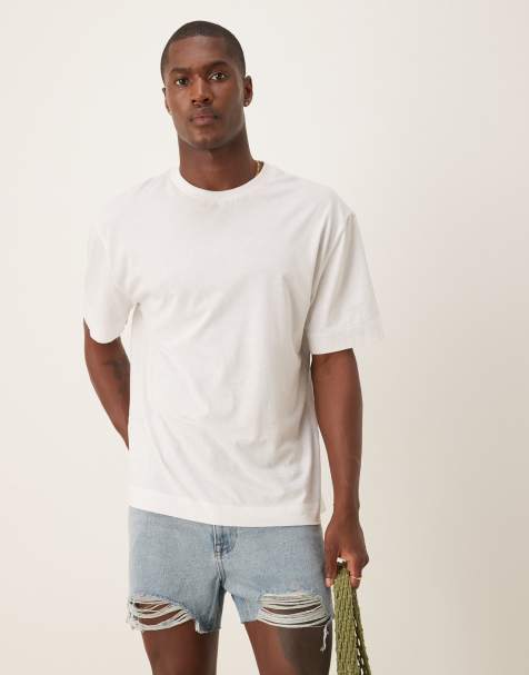ASOS DESIGN shorter length straight fit denim shorts with rip detail in light wash blue - view 1