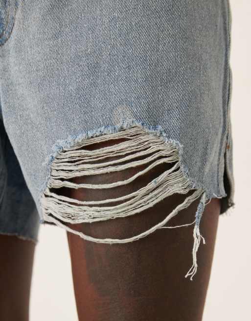 ASOS DESIGN shorter length straight fit denim shorts with rip detail in light wash blue