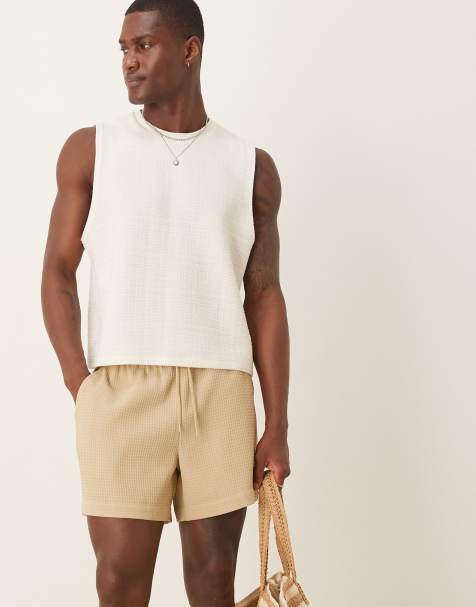 ASOS DESIGN shorter length waffle shorts in beige - view 1
