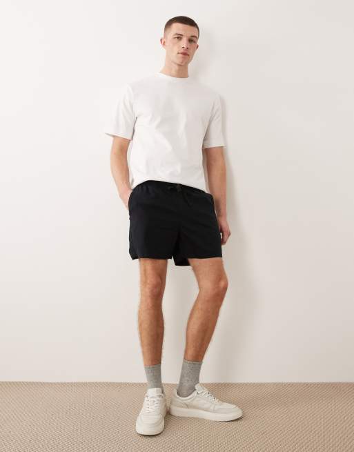 ASOS DESIGN – Shorts aus Leinenmix in Schwarz mit schmalem, kürzerem Schnitt, 4 von 5