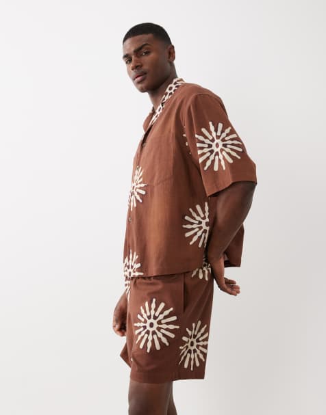ASOS DESIGN – Shorts in Braun mit durchgehendem Sonnenmuster, Kombiteil - view 1