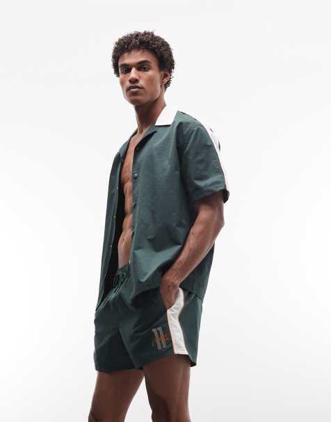 ASOS DESIGN – Shorts in kurzer Länge in Grün mit Stickerei, Kombiteil - view 1