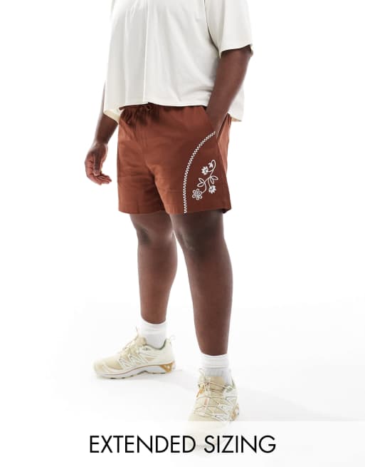 ASOS DESIGN shorts with contrast embroidery in brown