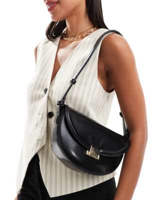 shoulder and crossbody bag with hardware closure in black