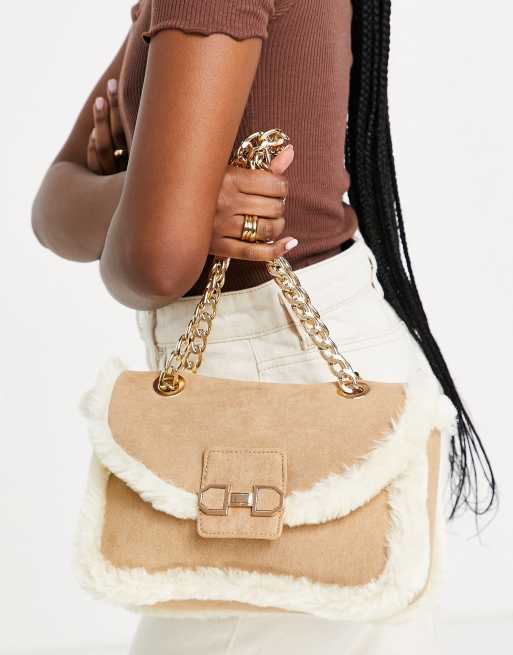 ASOS DESIGN shoulder bag in beige in faux shearling 
