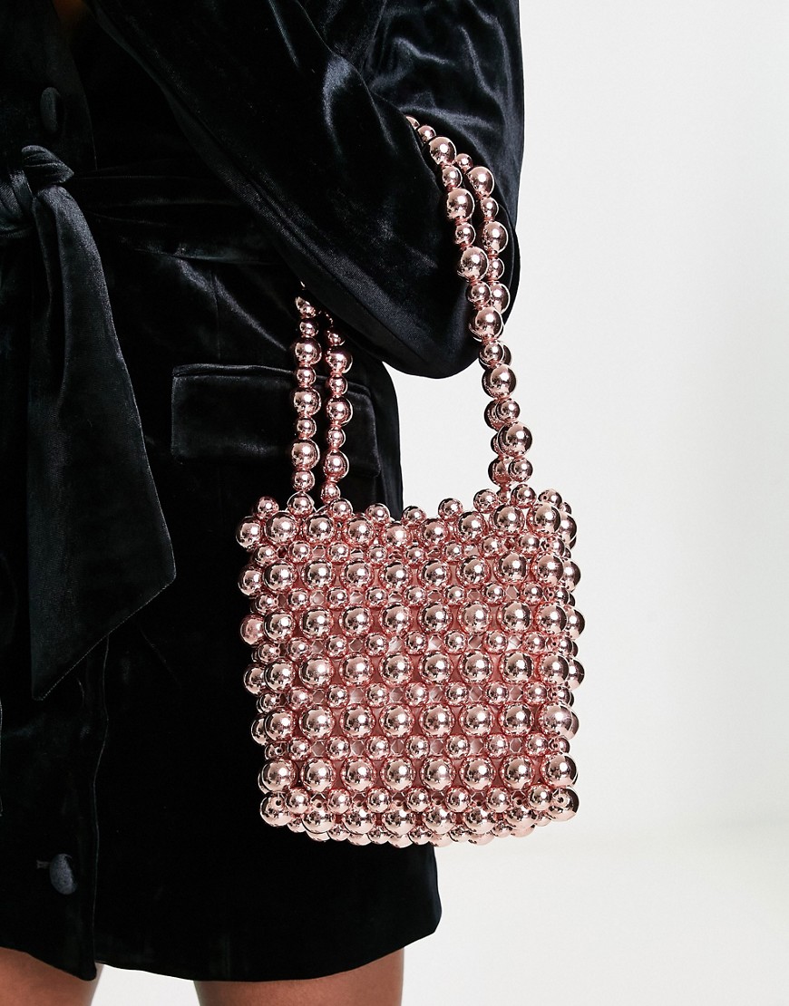 ASOS DESIGN shoulder bag with ball beads in pink