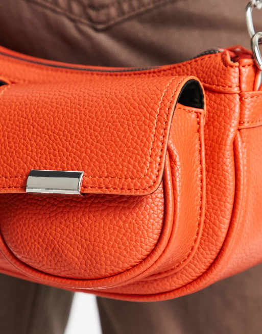 ASOS DESIGN shoulder bag with double pockets in orange