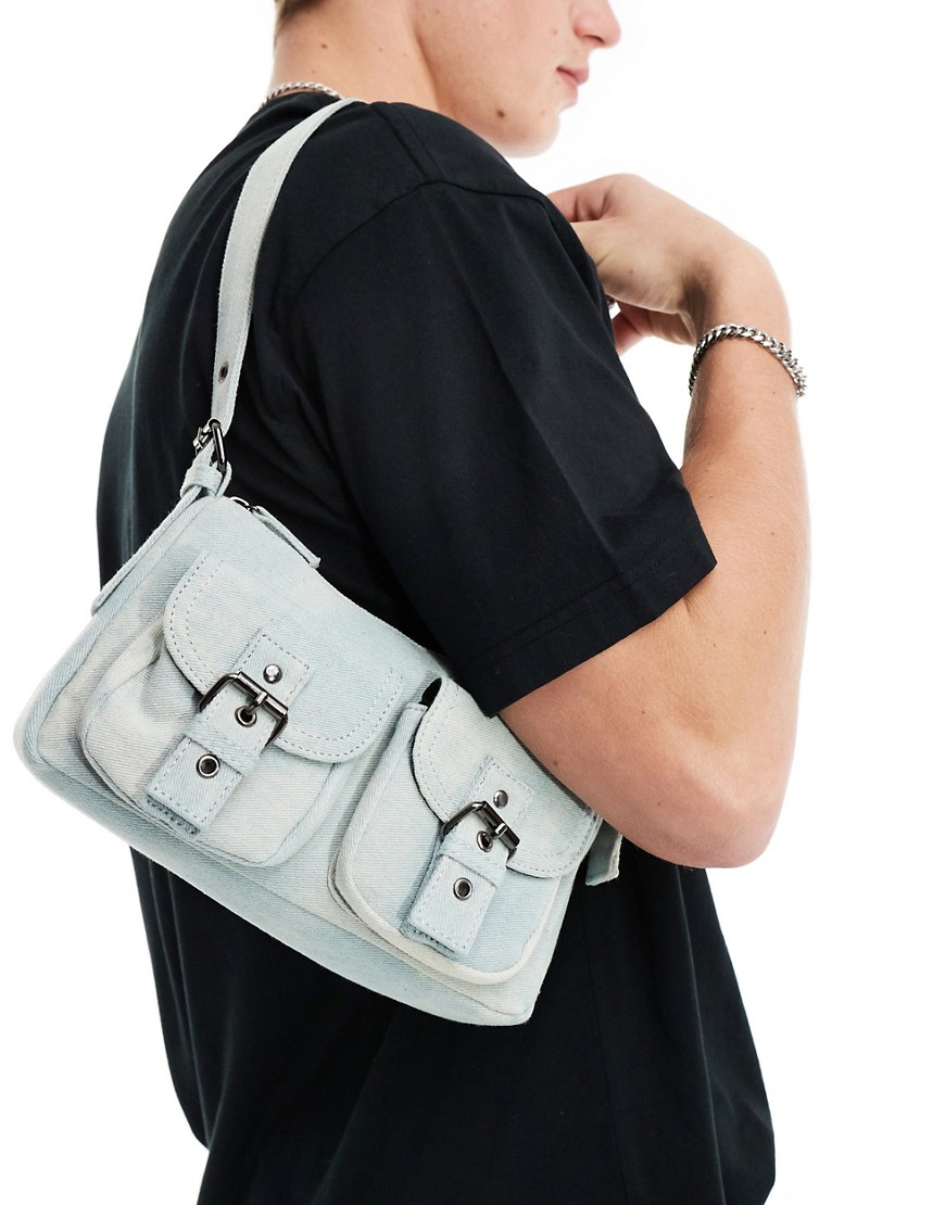 ASOS DESIGN shoulder bag with pockets and buckles in washed denim-Blue