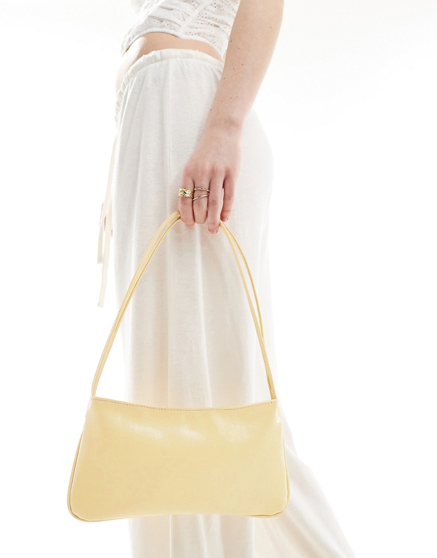 ASOS DESIGN shoulder bag with skinny double strap in buttermilk-Yellow